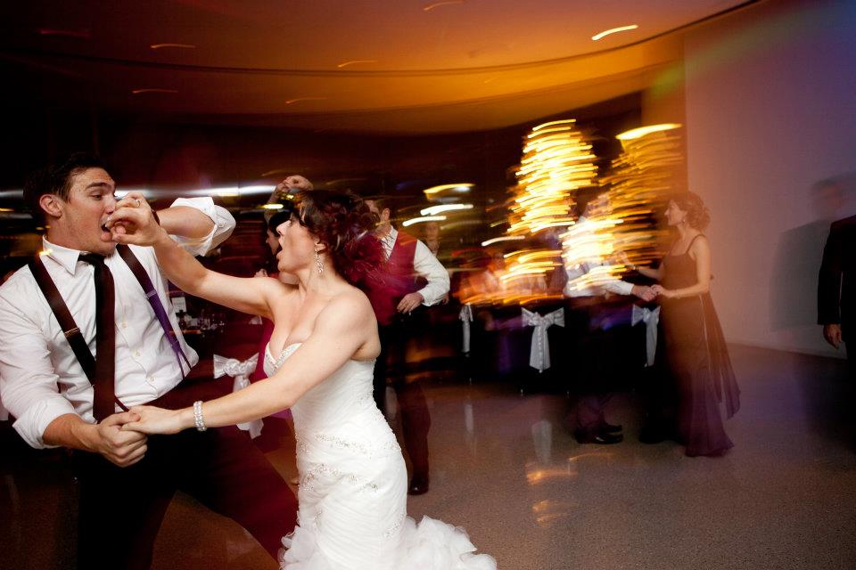 A wedding party celebrating on the dance floor